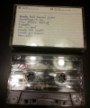B-side of the tape, front of inlay visible.
